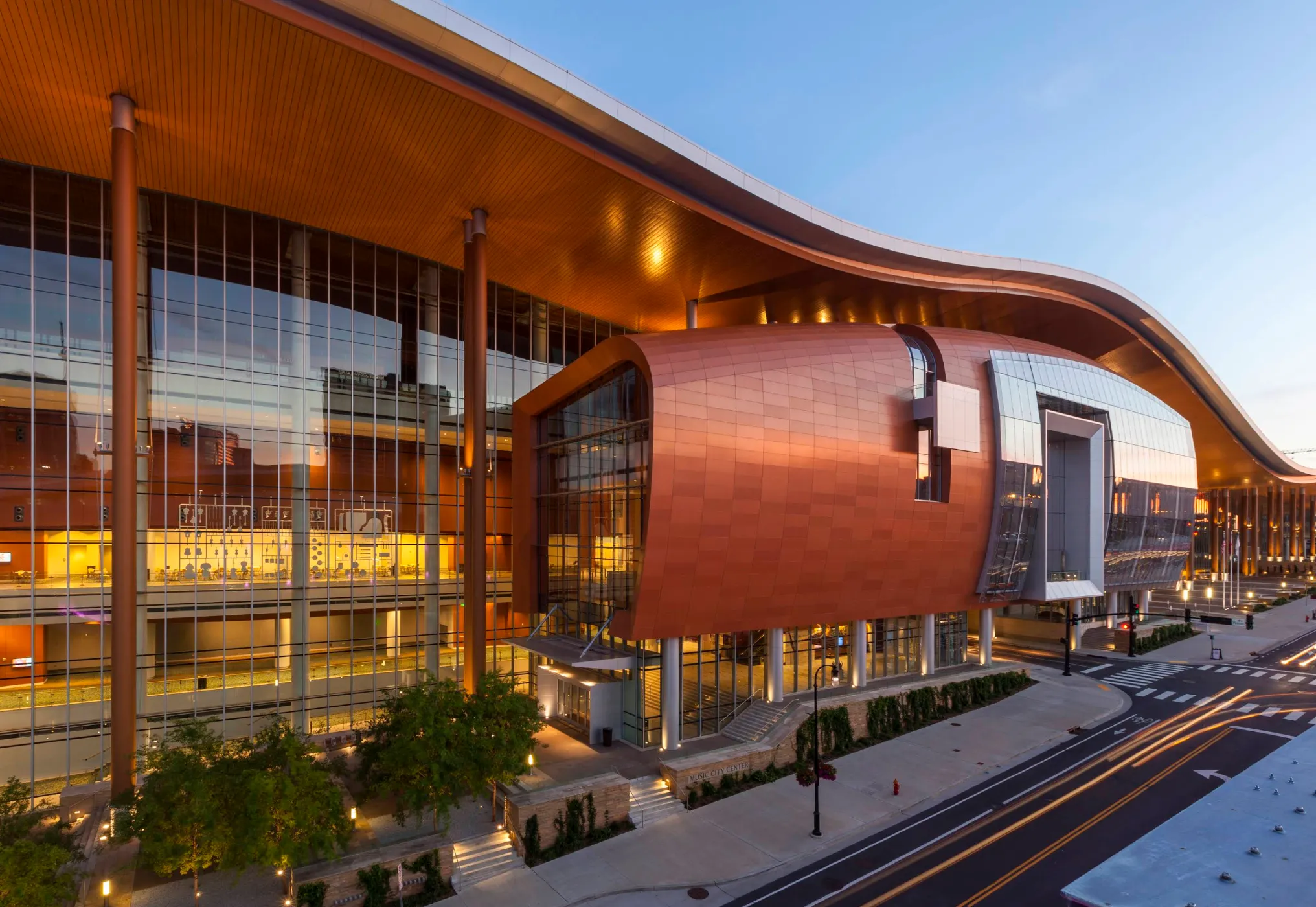 Image: Child kneeling to look at a star plaque on the Nashville Walk of Fame